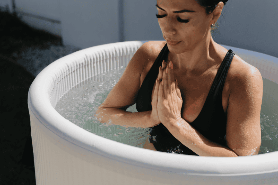 woman using breathing techniques in Ice Bath